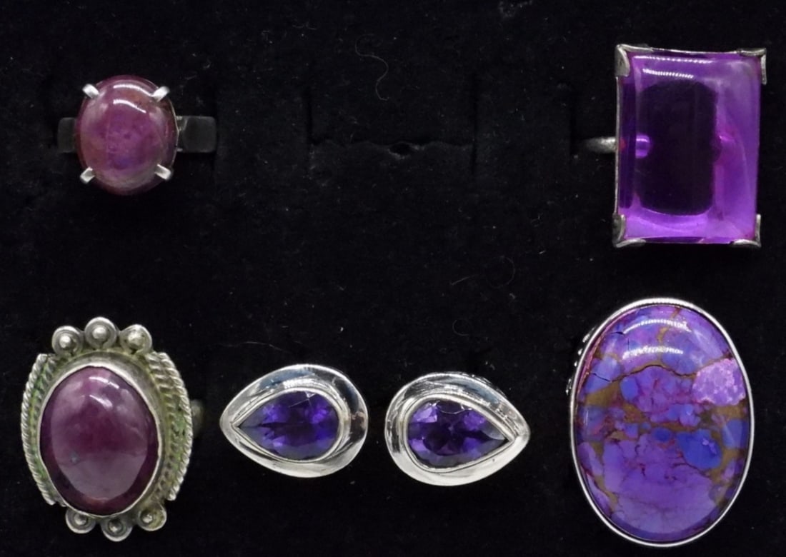 Sterling Purple Gemstone Rings: Five sterling rings with various purple gemstones. Sizes 5-10. (19 dwt)