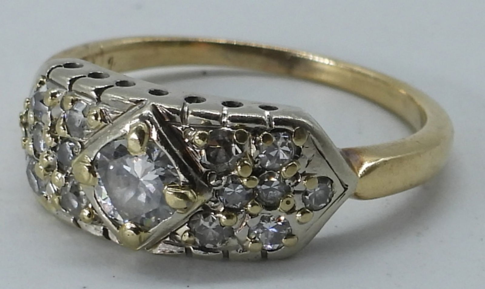 14K Yellow Gold & Diamond Ring: 14k yellow gold Diamond ring, size 6. Center stone is 1/2 carat diamond (tested). Some of the side diamonds test diamond and some test as Moissanite. Beautiful antique style. (1.3 dwt)