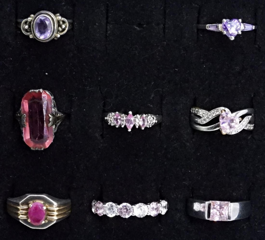 8 Sterling Amethyst & Pink CZ Fashion Rings: Eight sterling fashion rings. Amethyst, Pink CZ and simulated Diamond gemstones. Sizes 4.5 - 8.5 (17.9 dwt)