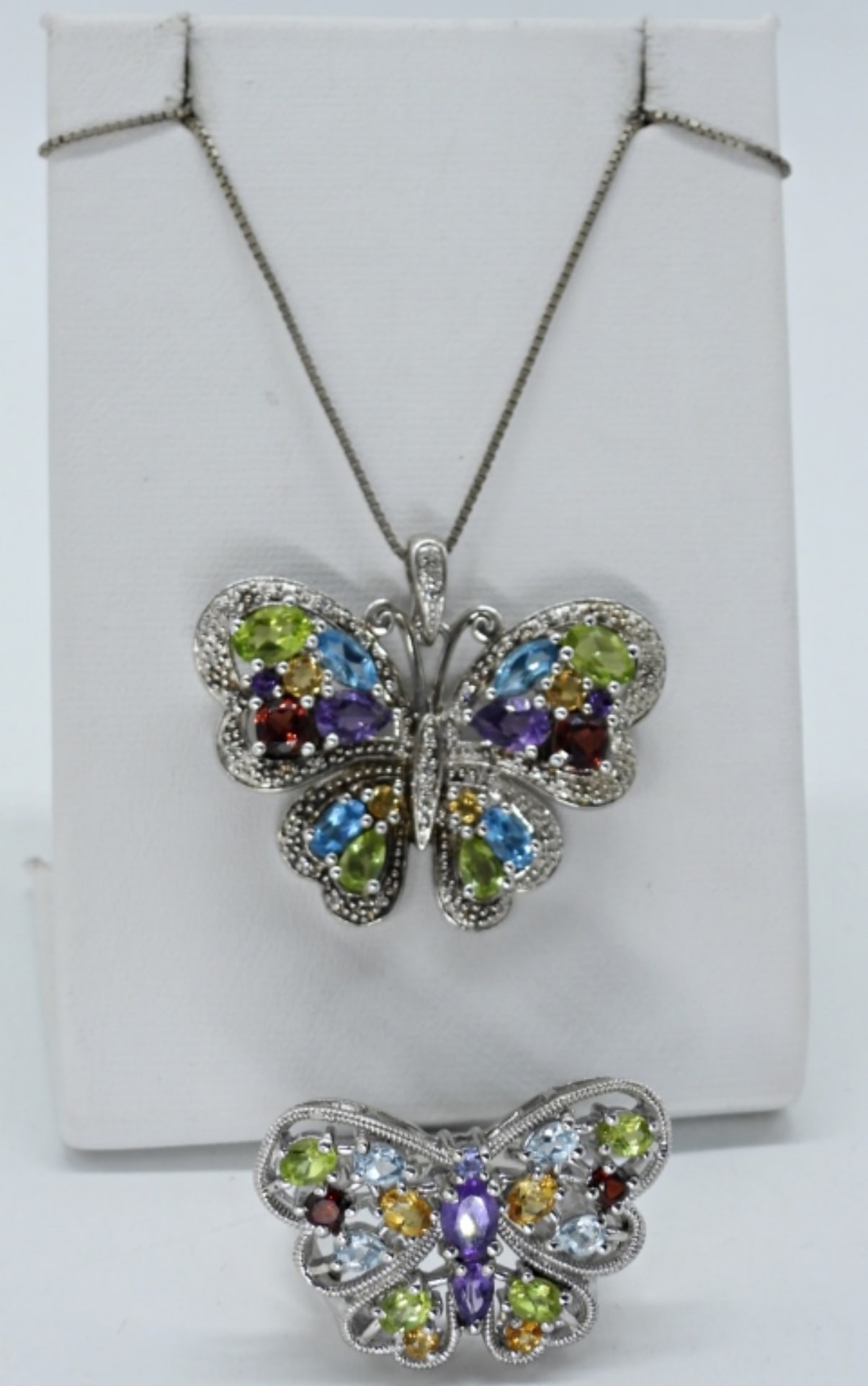 Multi Gemstone 925 Butterfly Necklace & Ring: Multi gemstone sterling butterfly necklace and ring. Necklace is 18" long and ring is size 8. (12 dwt)