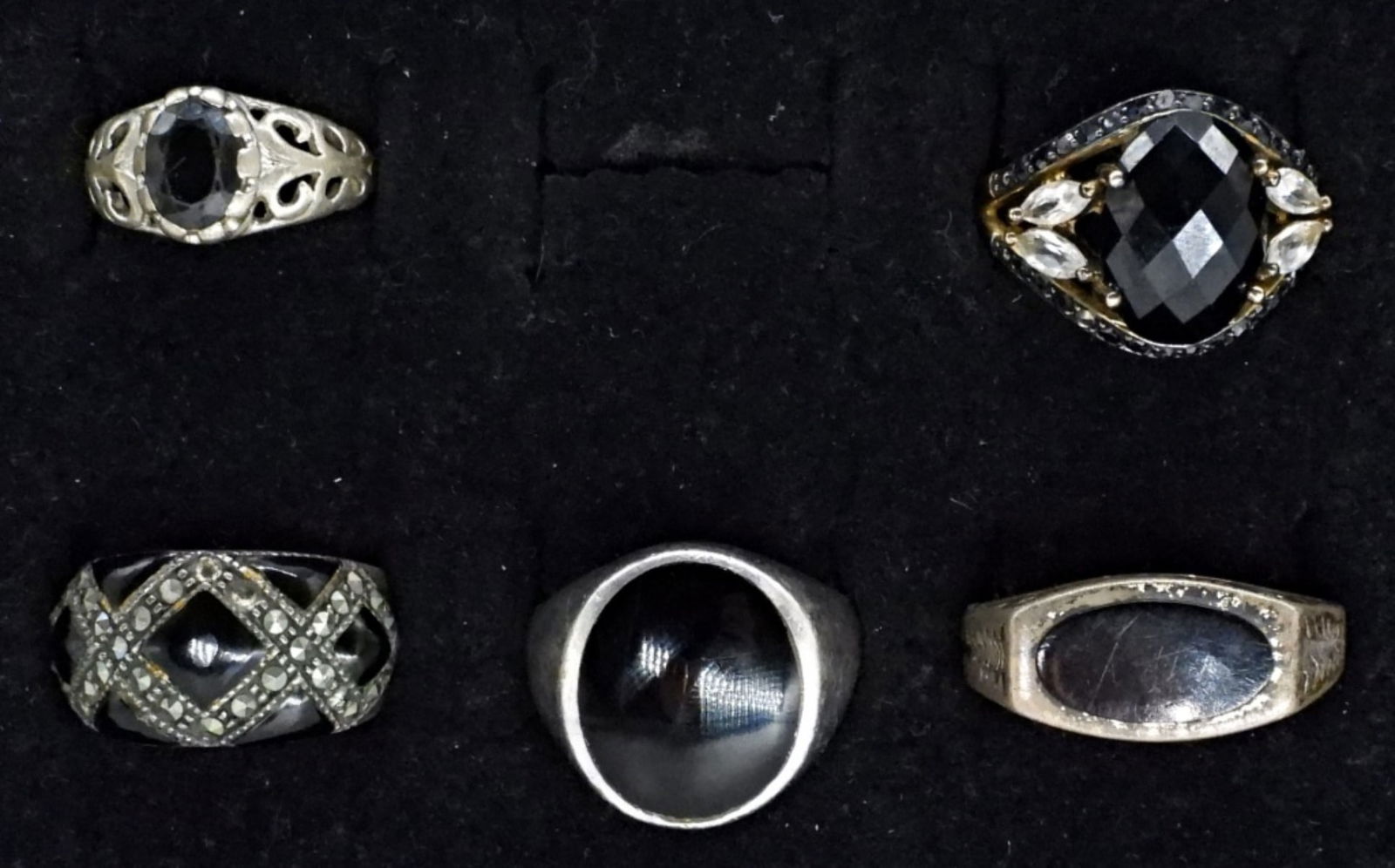 5 Black Onyx Sterling Fashion Rings: Five black onyx, sterling fashion rings. Sizes 4, 8, 9.5, 10.5 (18.5 dwt)