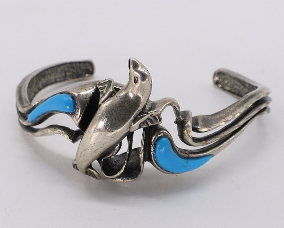 Sterling Turquoise Sea Lion Cuff Bracelet: Sterling turquoise cuff bracelet with Sea Lion décor. (12.5 dwt)