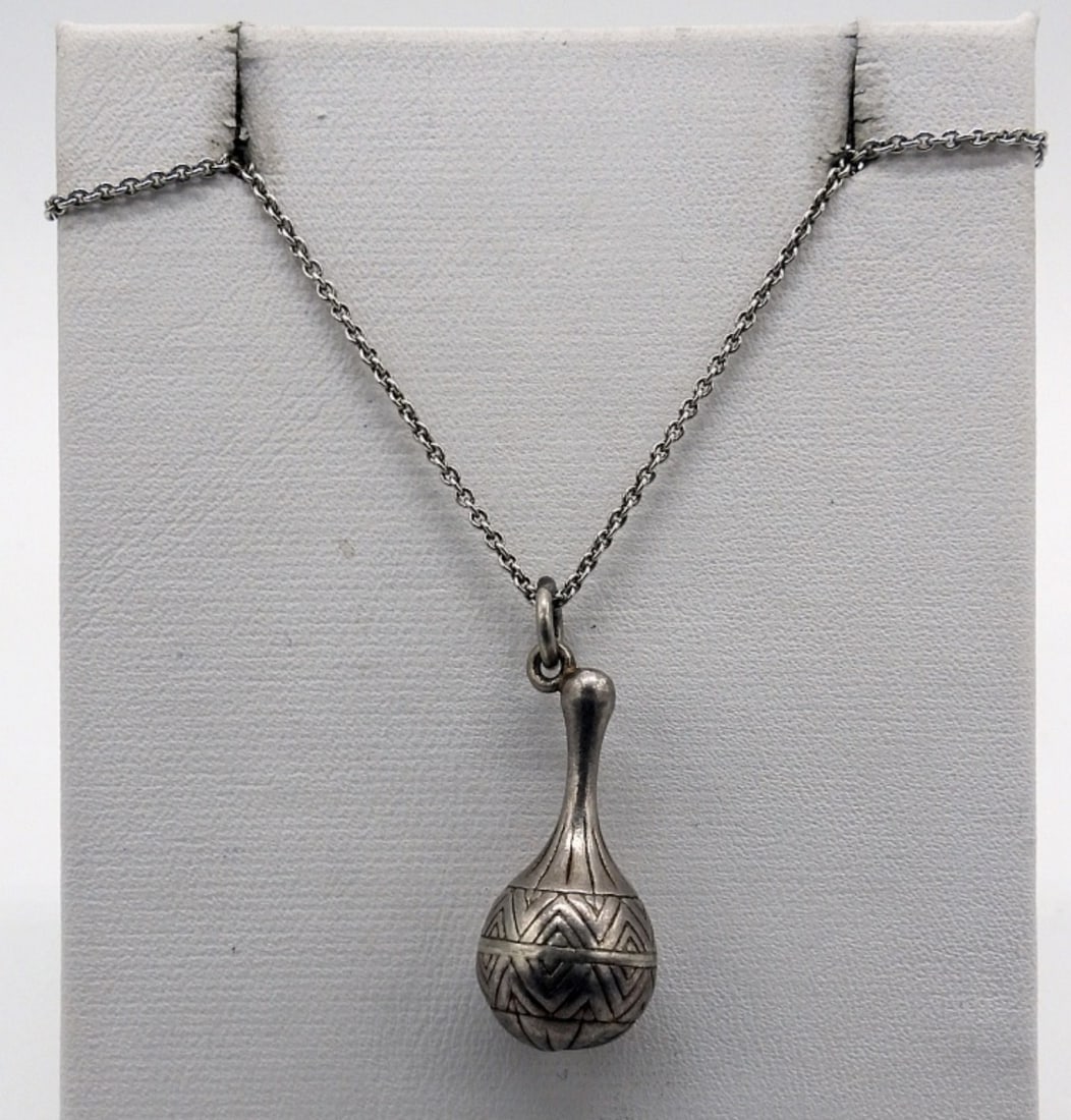 Vintage Sterling Maraca Necklace: Vintage sterling necklace with a sterling Maraca pendant, 18" long. (3 dwt)