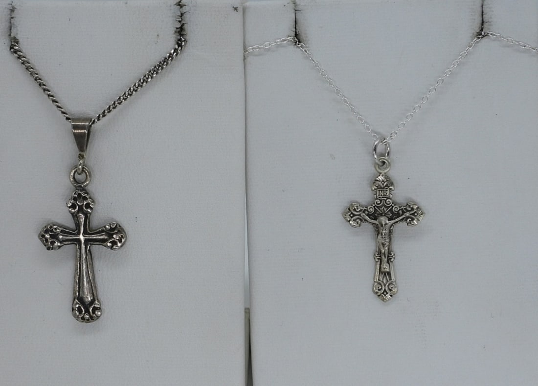 2 Sterling Religious Cross Necklaces: Two sterling religious cross necklaces, 18". (5.9 dwt)
