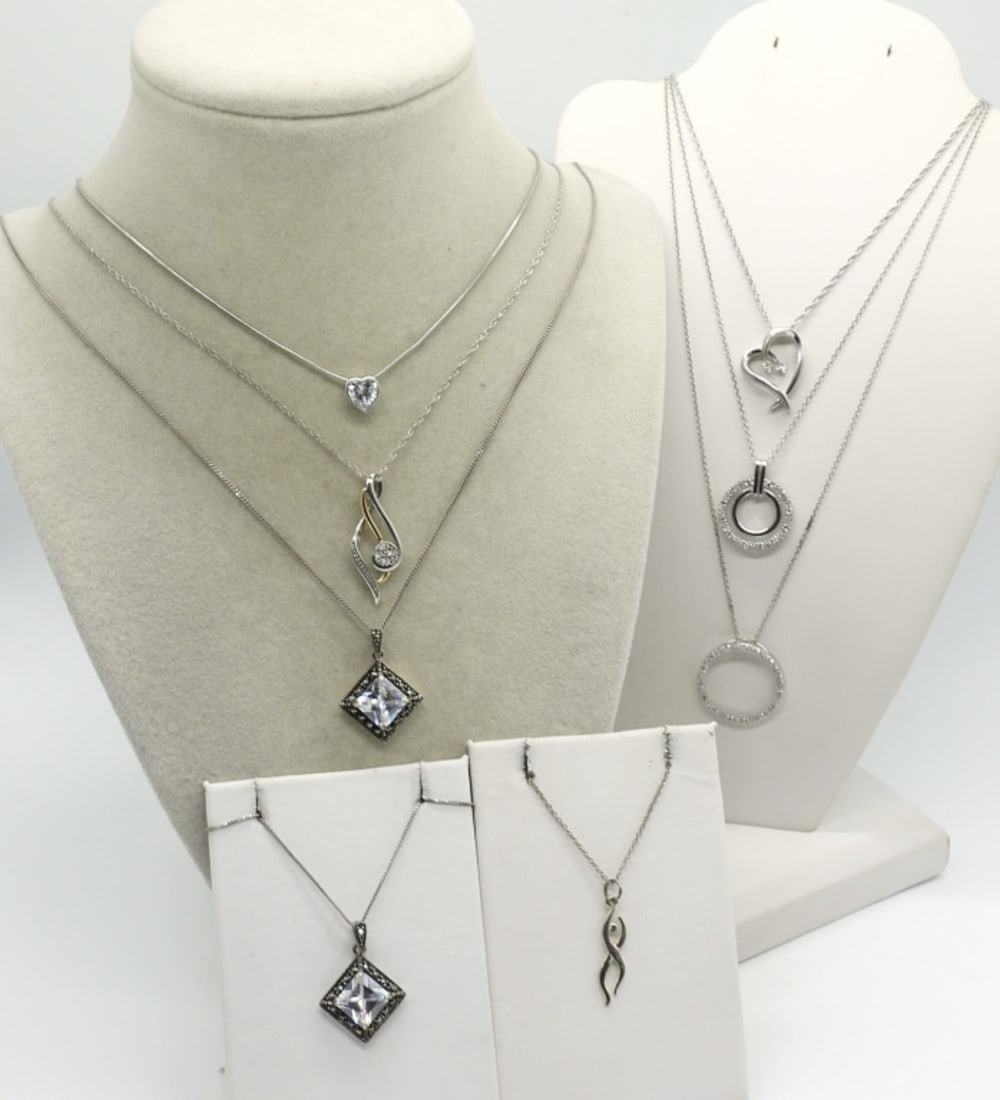 8 Sterling Fashion Necklaces: Eight sterling fashion necklaces, 16", 18" & 20" long chains. (17.7 dwt)