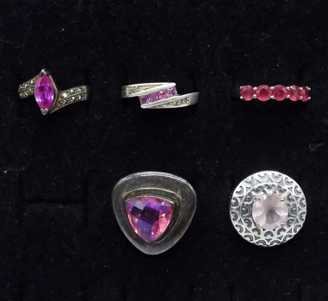 Five Sterling Pink Gemstone Fashion Rings: Five sterling pink gemstone fashion rings, sizes 6-8. (15 dwt)