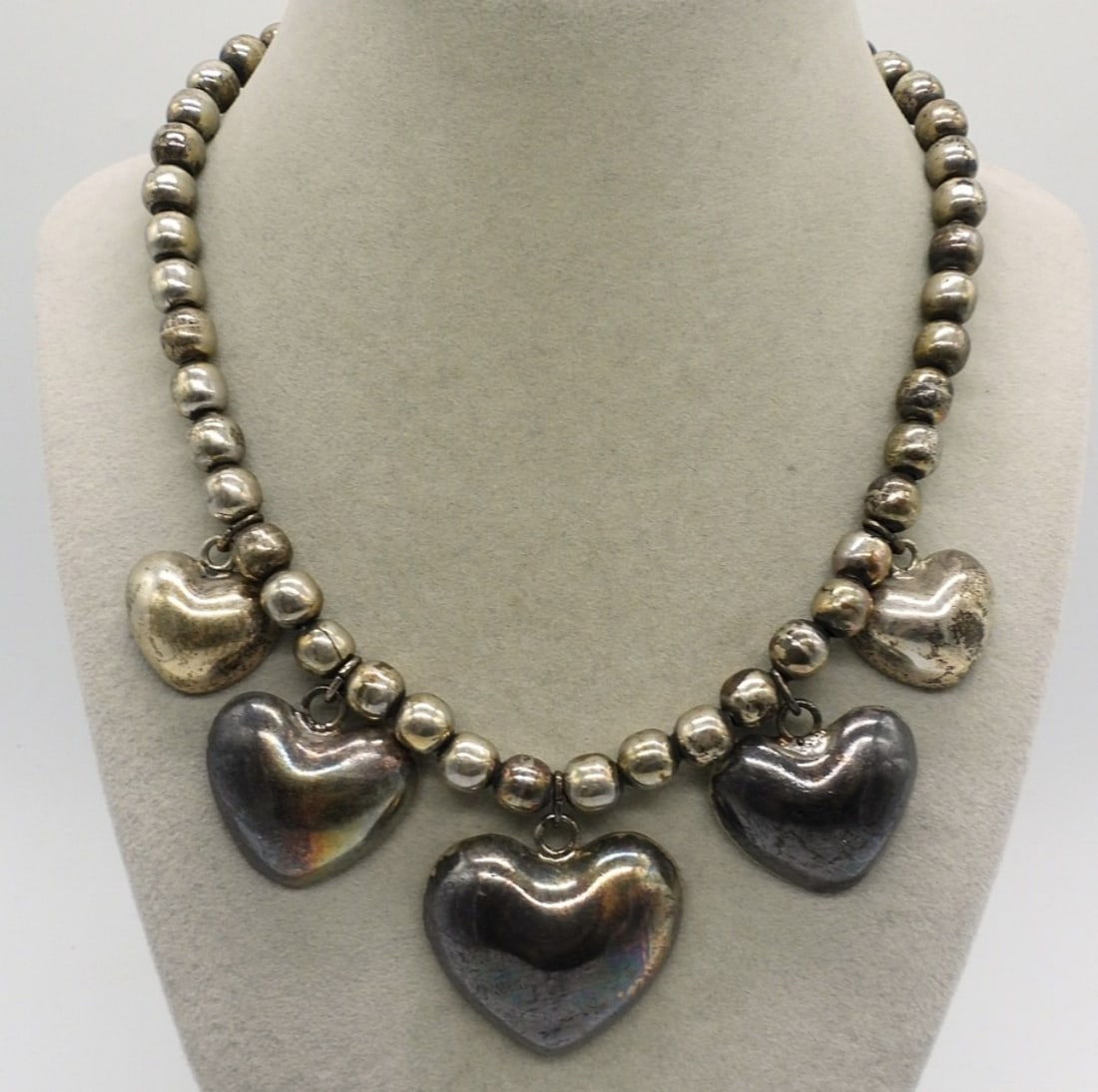 Sterling Taxco Hearts Necklace: Vintage sterling Taxco hearts necklace, marked "Mexico TO-34 925". 16" long. (36.9 dwt)