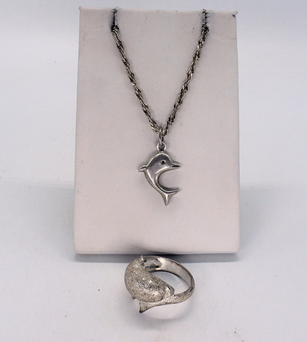 Dolphin 925 Necklace and Ring: Sterling Dolphin necklace, 38" chain. Ring is size 7. (8.8 dwt)