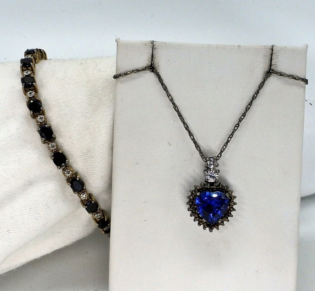 Simulated Sapphire Necklace & Bracelet 925: Sterling simulated sapphire necklace, 22" long. Bracelet is 7", clasp works but isn't tight. Does have safety clasps. (10.6 dwt)