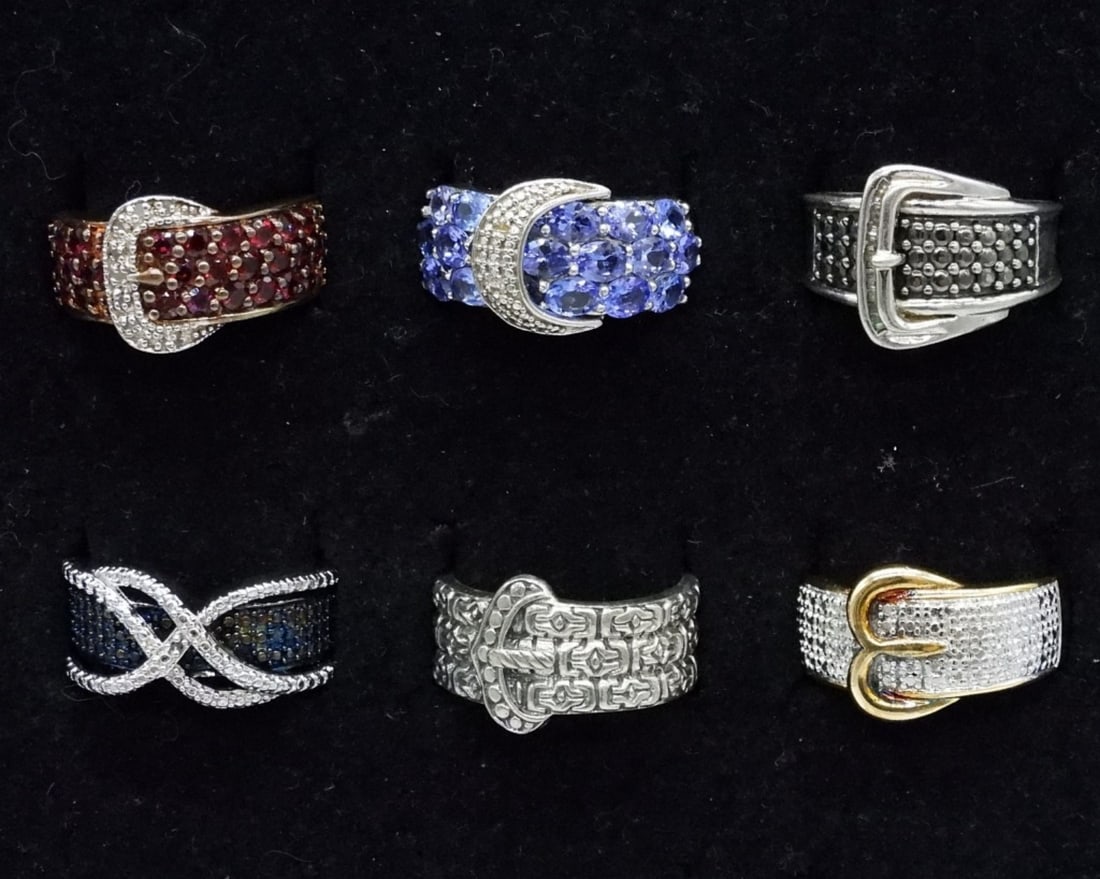 6 Belt Buckle Style Sterling Fashion Rings: Six sterling fashion rings, most look like belts. Sizes 6, 7, 8. (20 dwt)