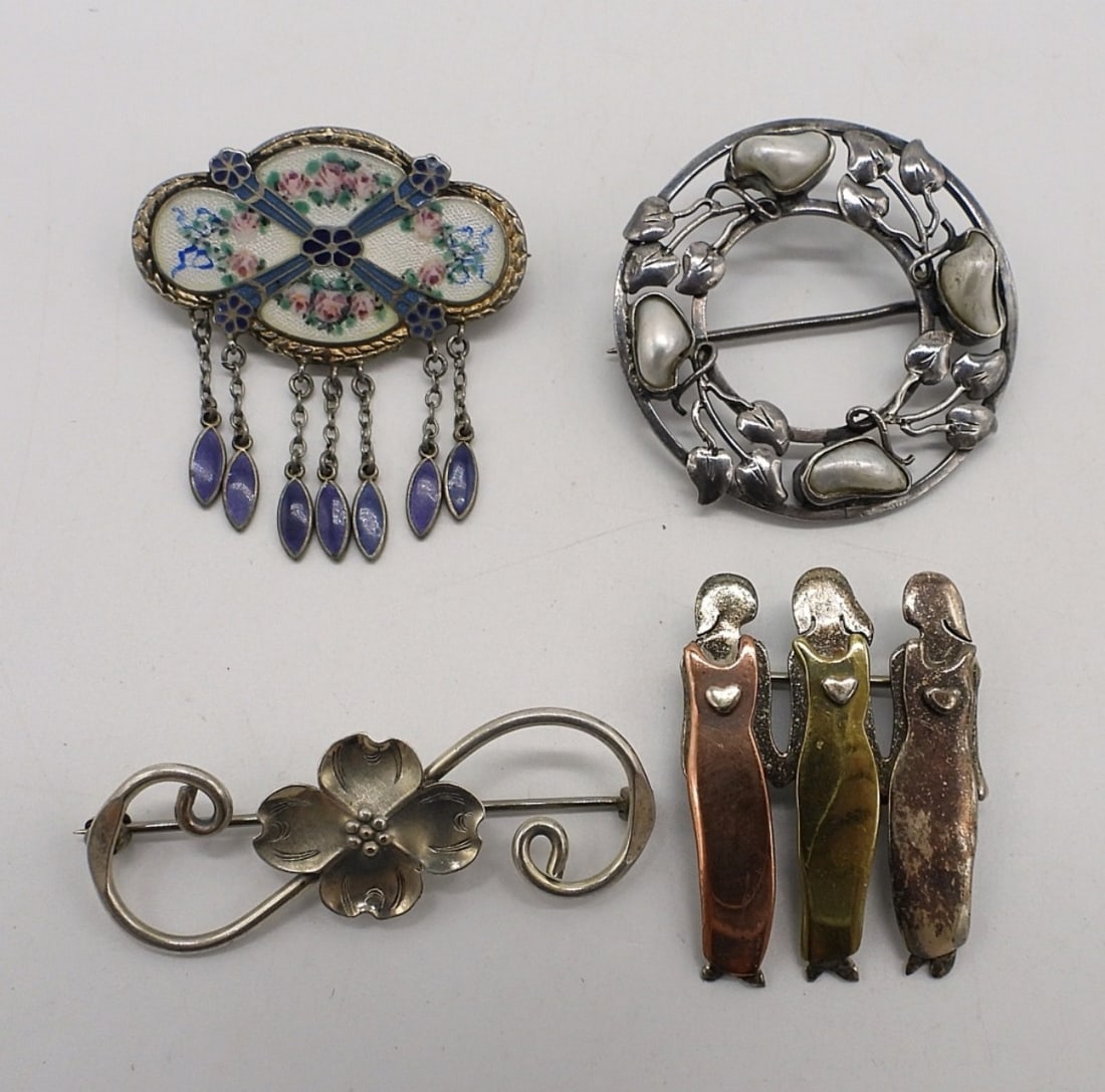 4 Vintage Sterling Pins: Four vintage sterling pins, 1-2" long/wide. (14 dwt)