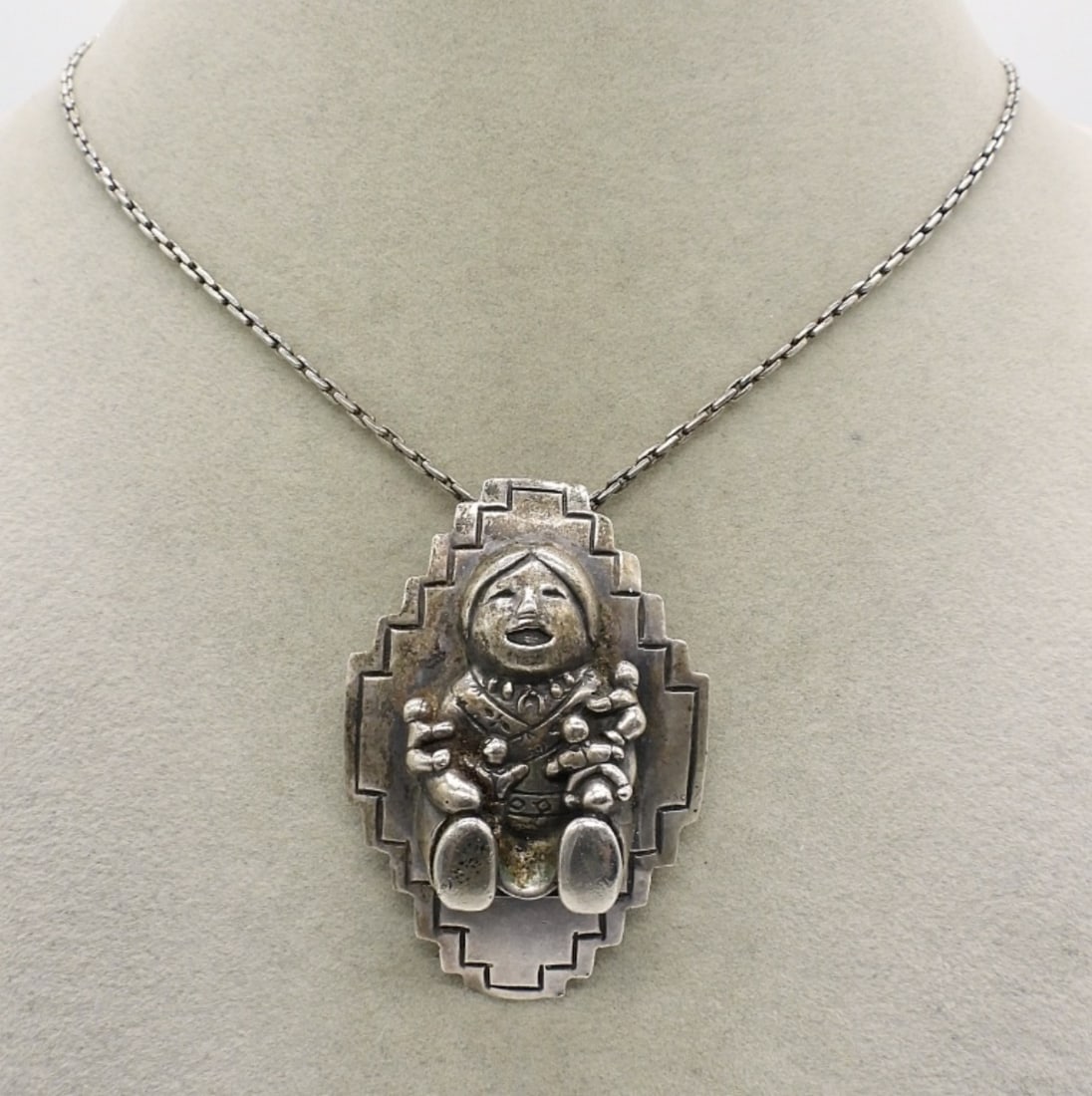 Carol Felley, The Storyteller 925 Pendant: Vintage sterling pendant / pin of "The Storyteller". Signed with Carol Felley's markings. 2" long, 1" wide. On a 18" sterling chain. (17.4 dwt)