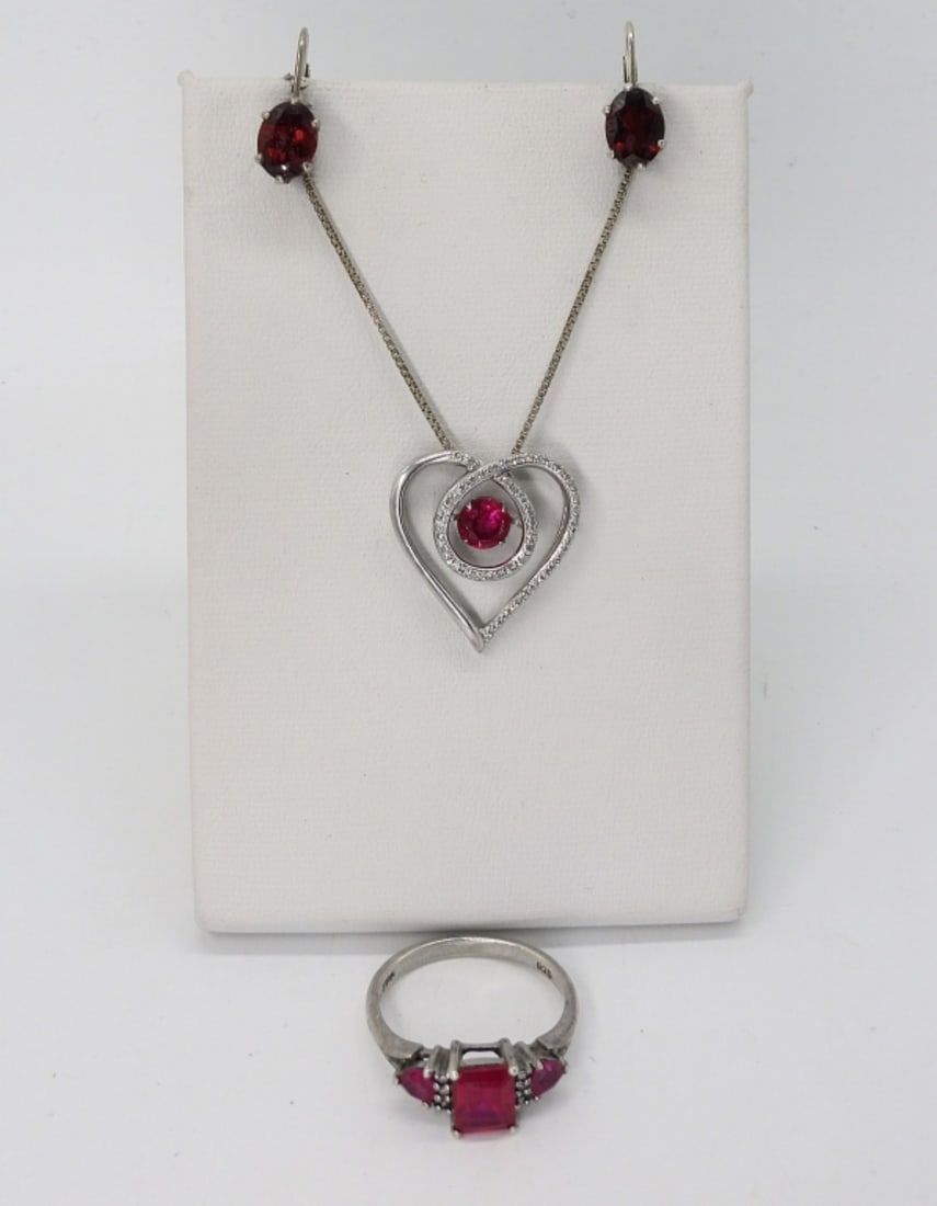 Simulated Ruby & Garnet 925 Necklace & More: Simulated ruby and garnet gemstones in sterling silver. Ring size 8. Necklace is 18" long. Earrings are 1" long. (5 dwt)