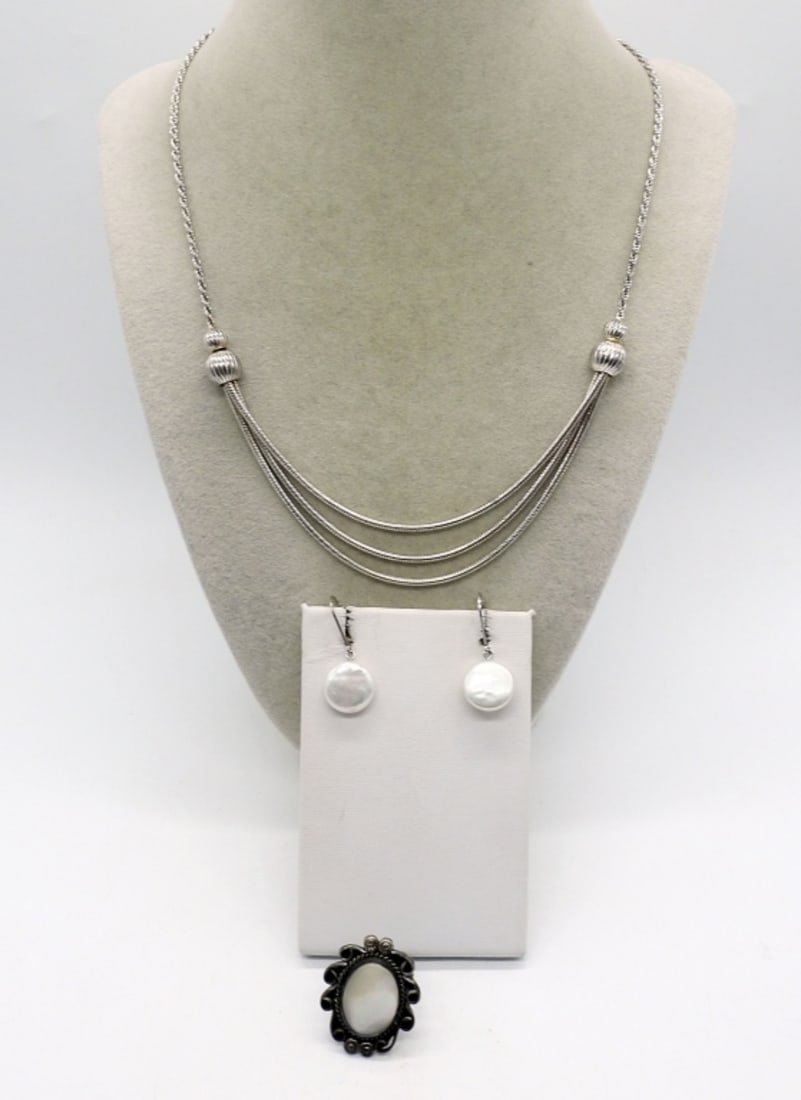Mother of Pearl Sterling Fashion Pieces: Sterling, Mother of pearl ring (size 7) and pierced earrings (1 1/4" long). Necklace is 18" long. (17 dwt)