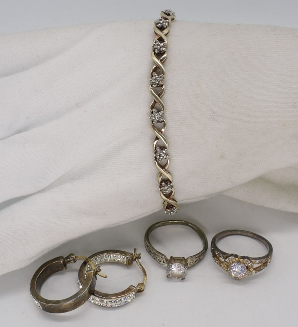 Fashion Sterling Rings, Bracelet, Earrings: Fashion Sterling bracelet, 7.5". Two rings, simulated diamonds, sizes 8 & 9. Pierced sterling hoops. (12 dwt)