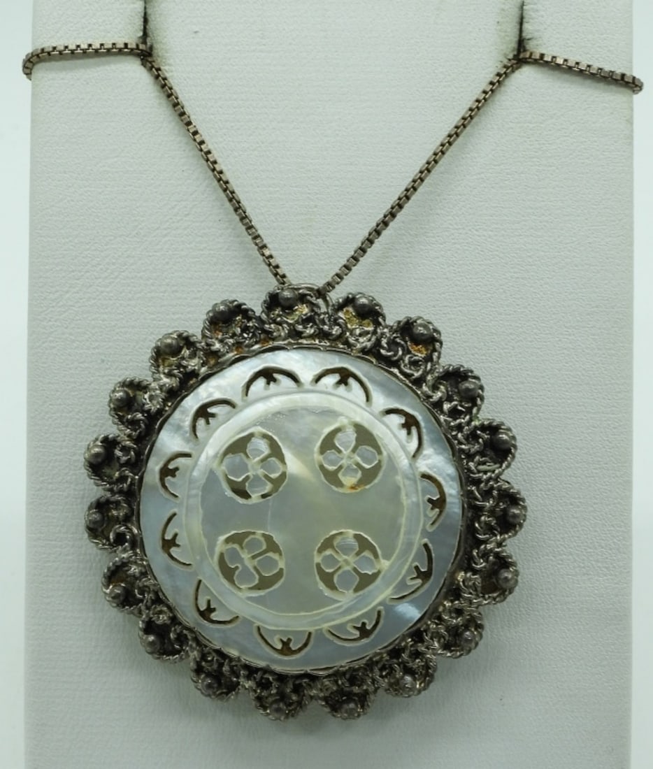 Bethlehem 950 Silver Necklace: Pendant (also a brooch) is marked "Bethlehem 950" with a mother of pearl front. On a sterling chain, 16" long. (6.9 dwt)
