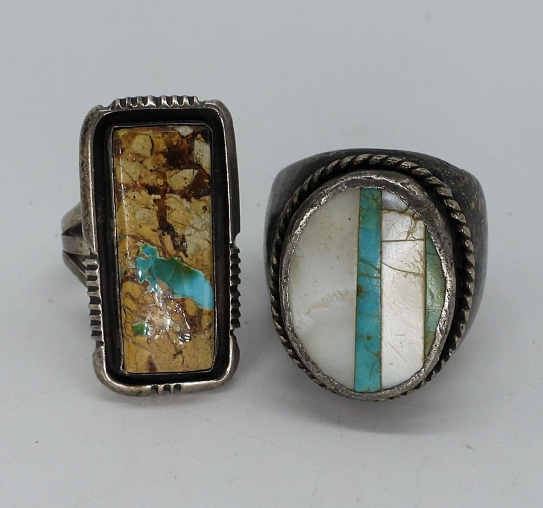 2 Ribbon Turquoise - Mother of Pearl Rings: Two sterling rings with ribbon turquoise, mother of pearl gemstones. Largest ring is misshapen but can be fixed. Sizes 8 & 11.5-12. Larger ring has no markings. (27 dwt)