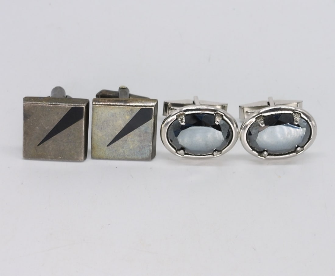 2 Pair Vintage Sterling Cuff Links: Two pair of vintage sterling cufflinks with black onyx and hematite gemstones. (16 dwt)