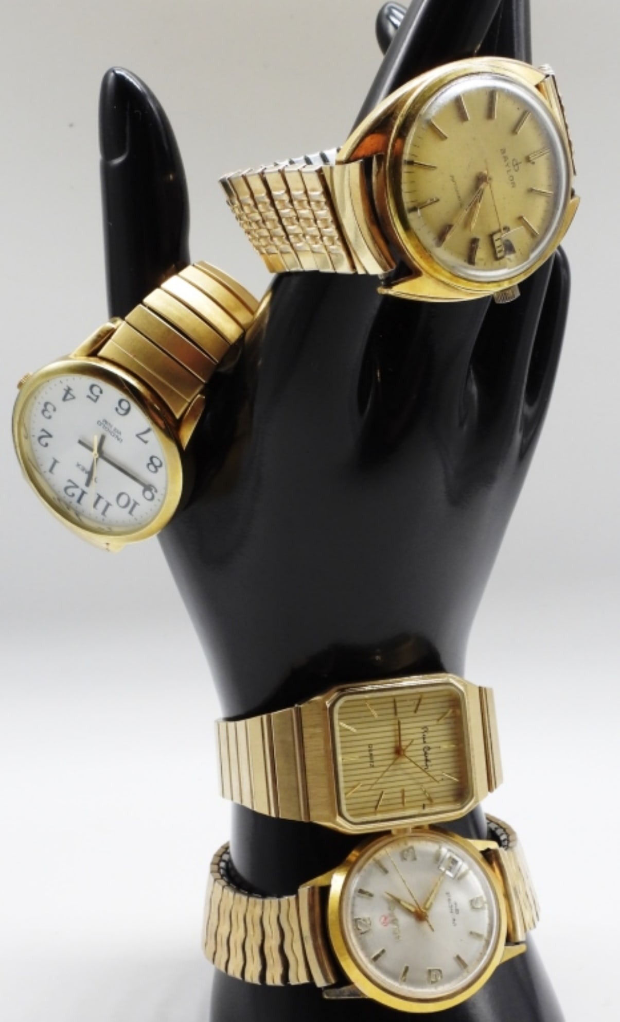 (4) Large Face Gold-Tone Watches: Timex, Helbros, Baylor, Pierre Cardin. Watches are not verified, authenticated, or tested in running condition unless otherwise specified.