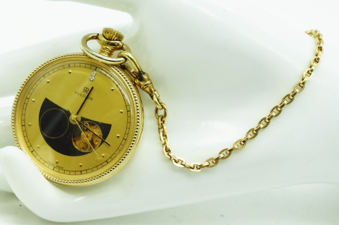Valcain Open Window Pocket Watch: This working watch requires manual winding to operate. Watches are not verified, authenticated, or tested in running condition unless specified.