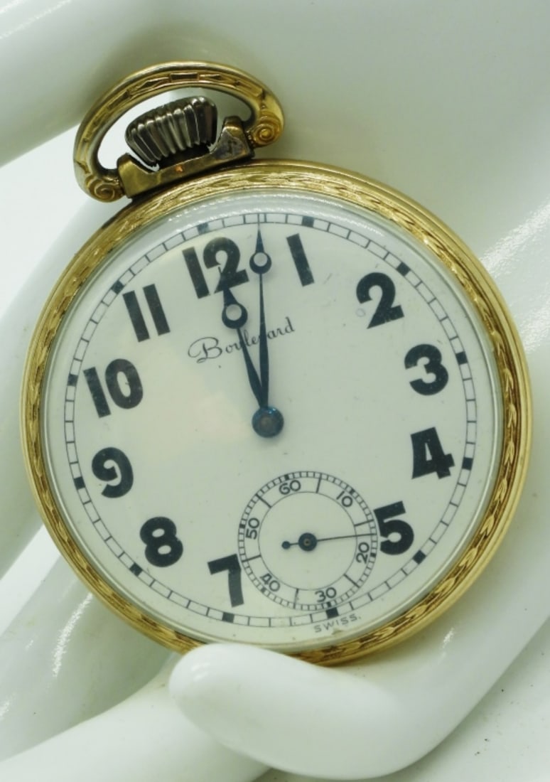 Boulevard Pocket Watch: The watch has an open-face white dial and black Arabic numerals and blue hands. Watches are not verified, authenticated, or tested in running condition unless specified.