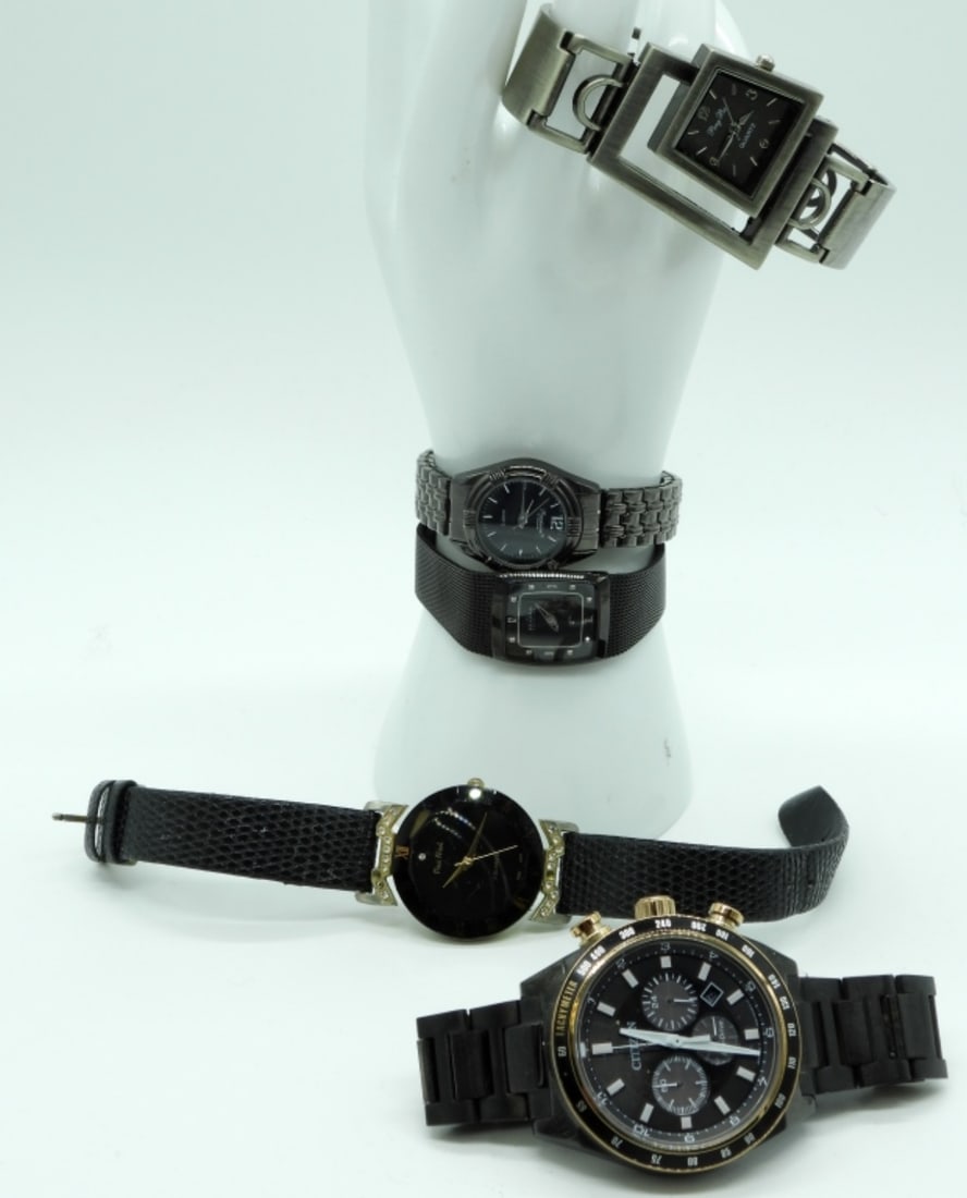 (5) Mixed Black Watches: Different styles. 4- clasps and 1-streach band. Watches are not verified, authenticated, or tested in running condition unless otherwise specified.