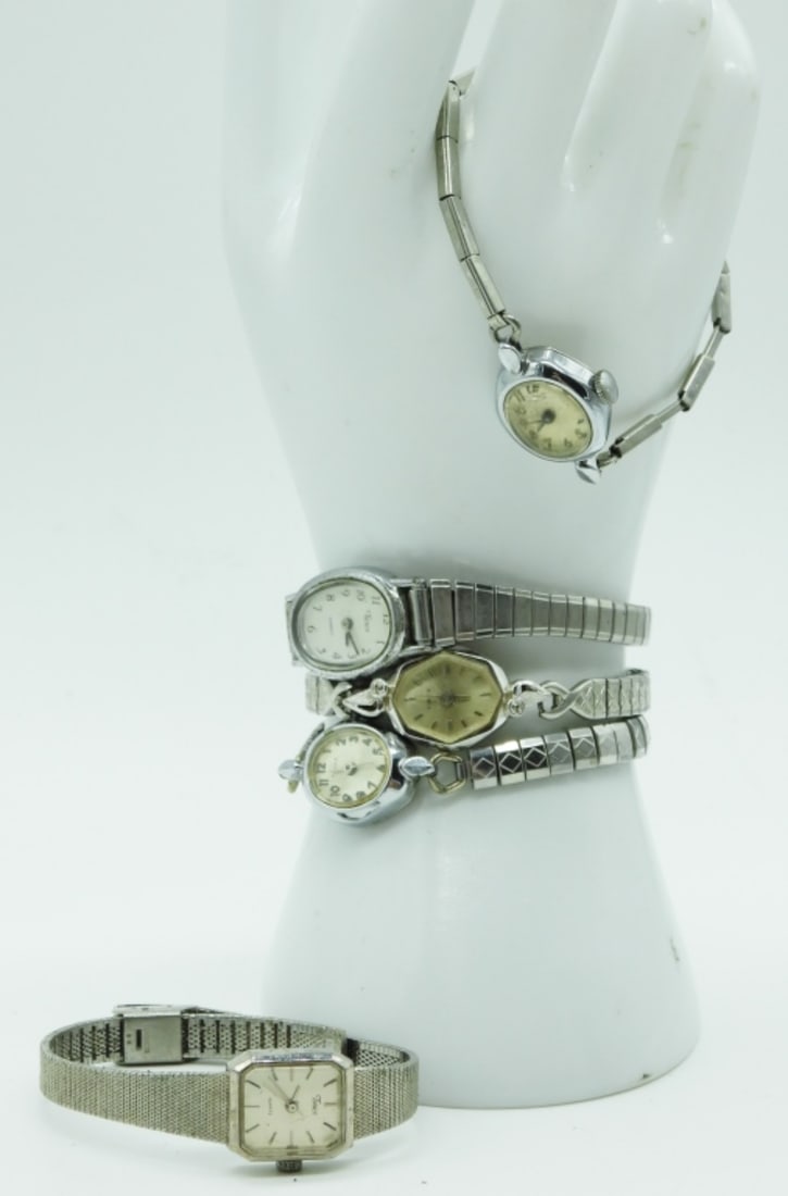 (5) Timex Dainty Watches: 4-stretchy and 1-clasp. Watches are not verified, authenticated, or tested in running condition unless otherwise specified.