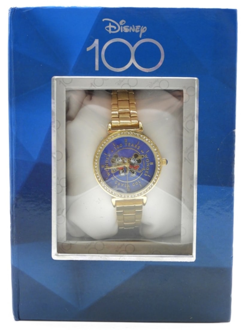 Disney 100 Years Of Wonder Watch: Still in its original box. Minnie & Mickey are in the middle. Watches are not verified, authenticated, or tested in running condition unless specified.