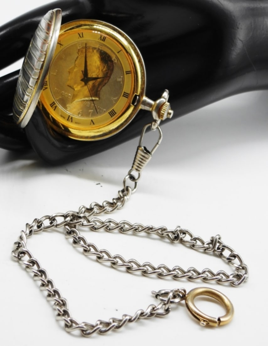 Collectible Pocket Watch: The watch face is a Kennedy half dollar minted in 1967. Watches are not verified, authenticated, or tested in running condition unless specified.