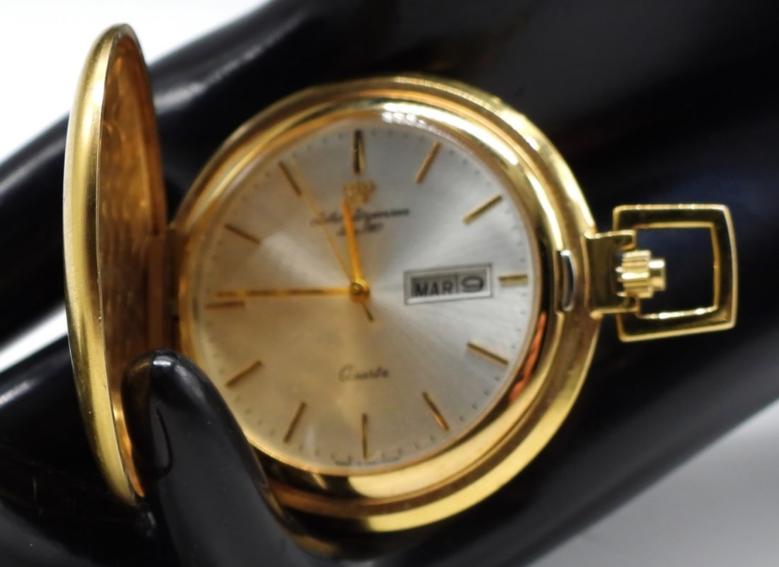 Jules Jurgensen Pocket Watch: Produced in the U.S.A. and day and date window at 3 o'clock. Watches are not verified, authenticated, or tested in running condition unless specified.