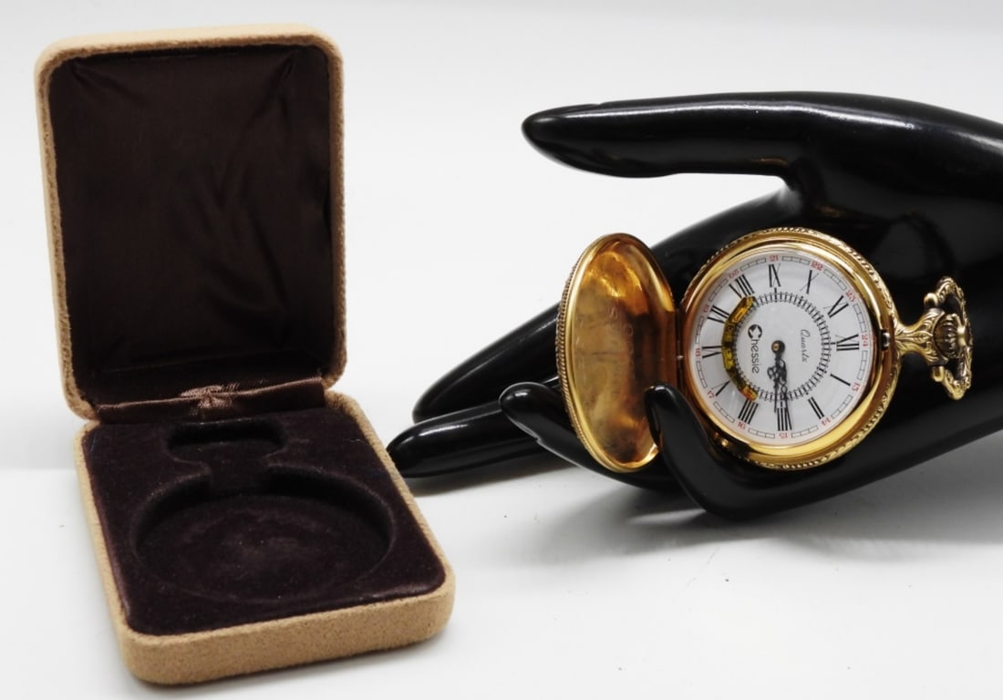 Chessie System Pocket Watch: Railroad-Themed. The watch case has a sleeping kitten tucked in. Watches are not verified, authenticated, or tested in running condition unless specified.