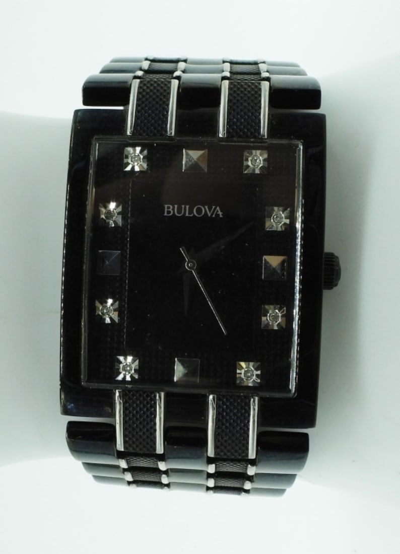 Bulova 98D111 30mm: A Diamond Quartz Men's Watch - Black Watches are not verified, authenticated, or tested in running condition unless specified