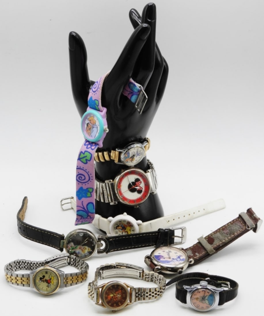 (9) Disney Child & Adult Watches: Cinderella, Snow White, Tinker Bell, Minnie Mouse, Mickey Mouse, Tiger, Pocahontas, and Lady and The Tramp. Watches are not verified, authenticated, or tested in running condition unless specified.