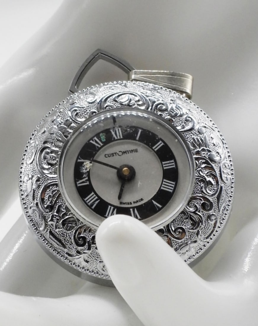 CustOmtime Pendant Watch: Working! This watch ha a silver-tone floral scroll pattern case. Watches are not verified, authenticated, or tested in running condition unless specified.