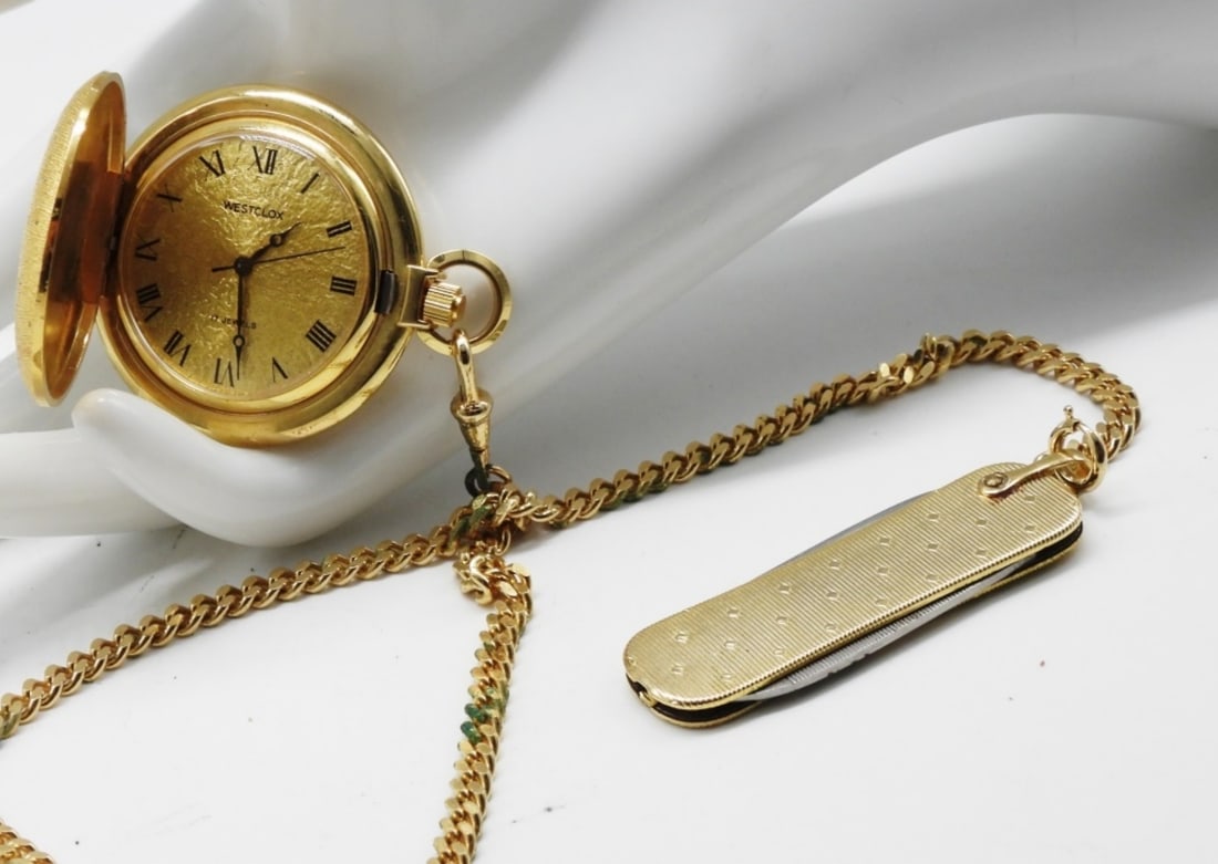 Westclox 17 Jewels Pocket Watch: Works! This beautiful gold-tone pocket watch comes with a chain and a gentleman's knife. (has some type of paint on the chain.) Watches are not verified, authenticated, or tested in running condition