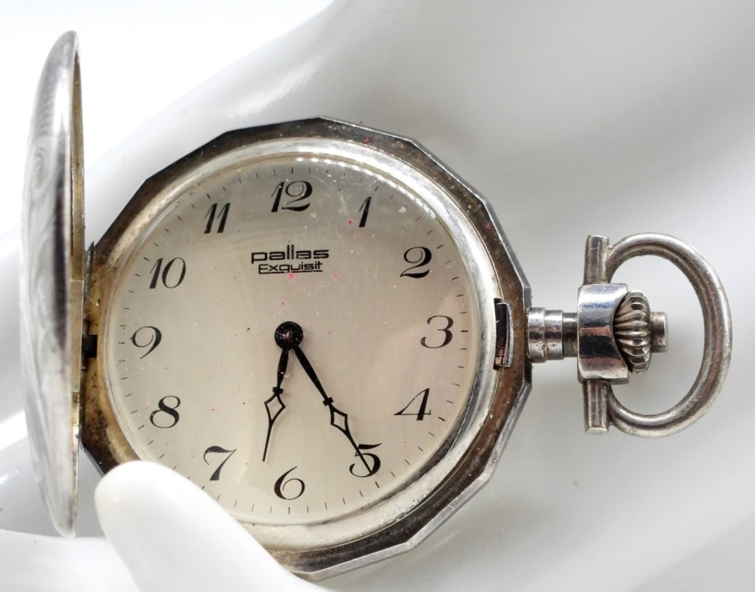 Pallas Pocket Watch: Working! This watch features a distinctive multi- faceted case and a silver-colored dial. Watches are not verified, authenticated, or tested in running condition unless specified.