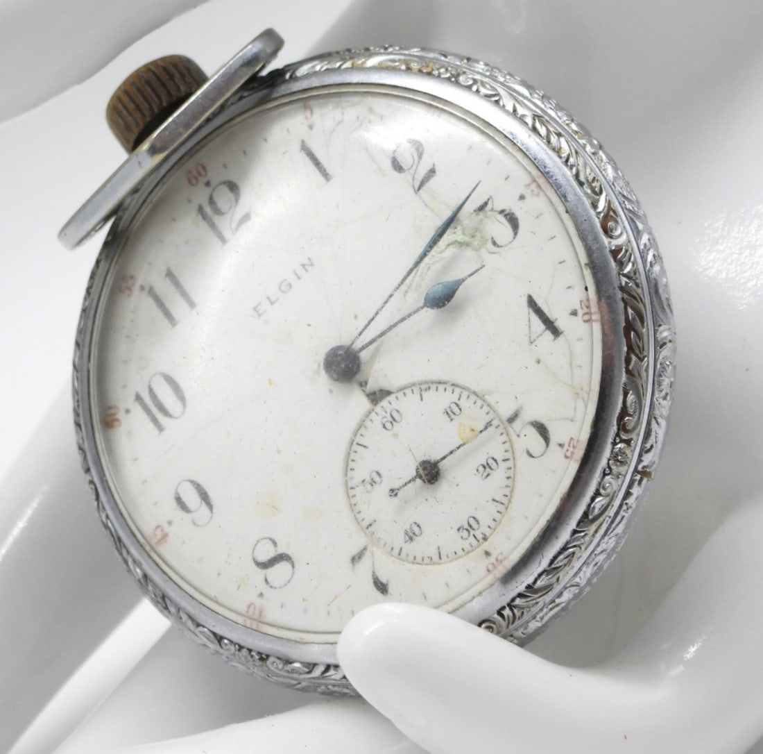 Elgin Open Faced Pocket Watch: Works! There is damage to the crystal and the face of the watch. Winds well. Watches are not verified, authenticated, or tested in running condition unless specified.