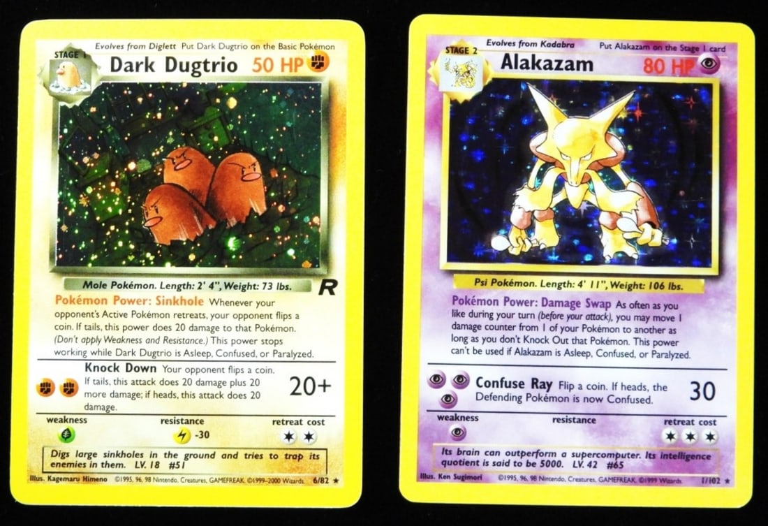 (2) Pokemon Cards VG: Alakazam 1/102 1999 Holo Stage 2 Psychic 80HP. Dark Dugtrio 6/82 2000 Holo Stage 1 50HP
