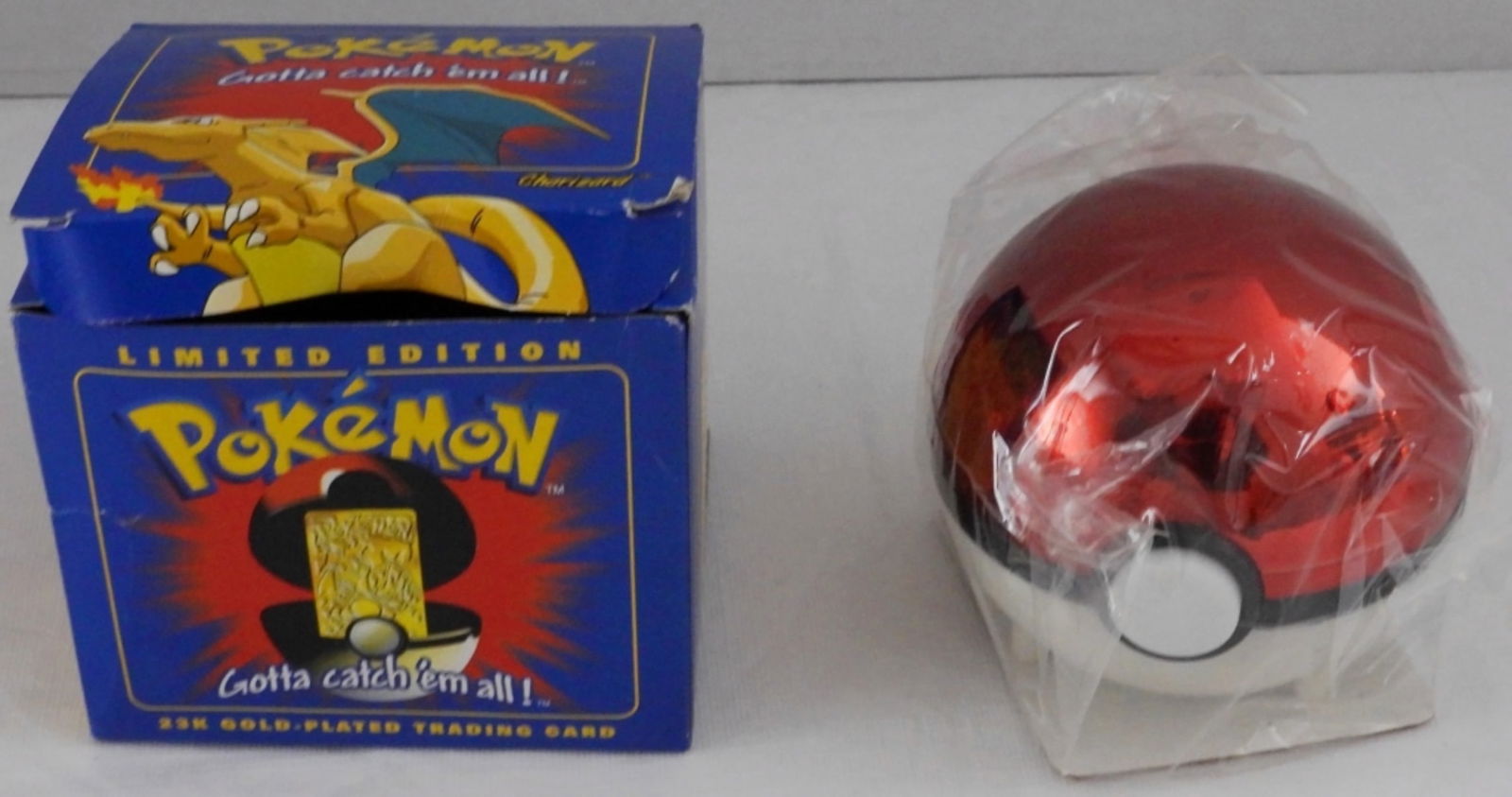 Charizard 23K Gold-Plated Trading Card: Slight damage to box, Pokemon still in bag