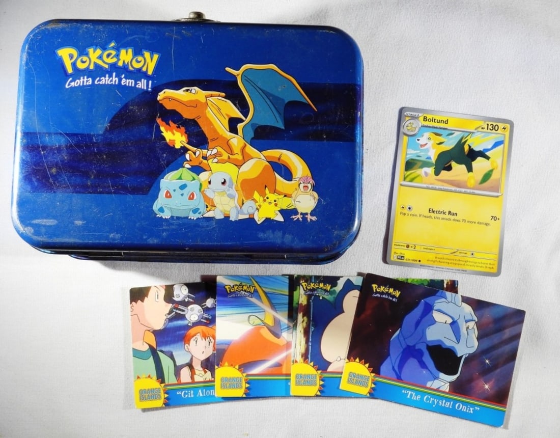 Pokemon Tin & (5) Cards G-VG: The tin has been well used. Cards: The crystal Onix, Snack Attack Stage Fight, Boltund, Get along, little Pokemon.