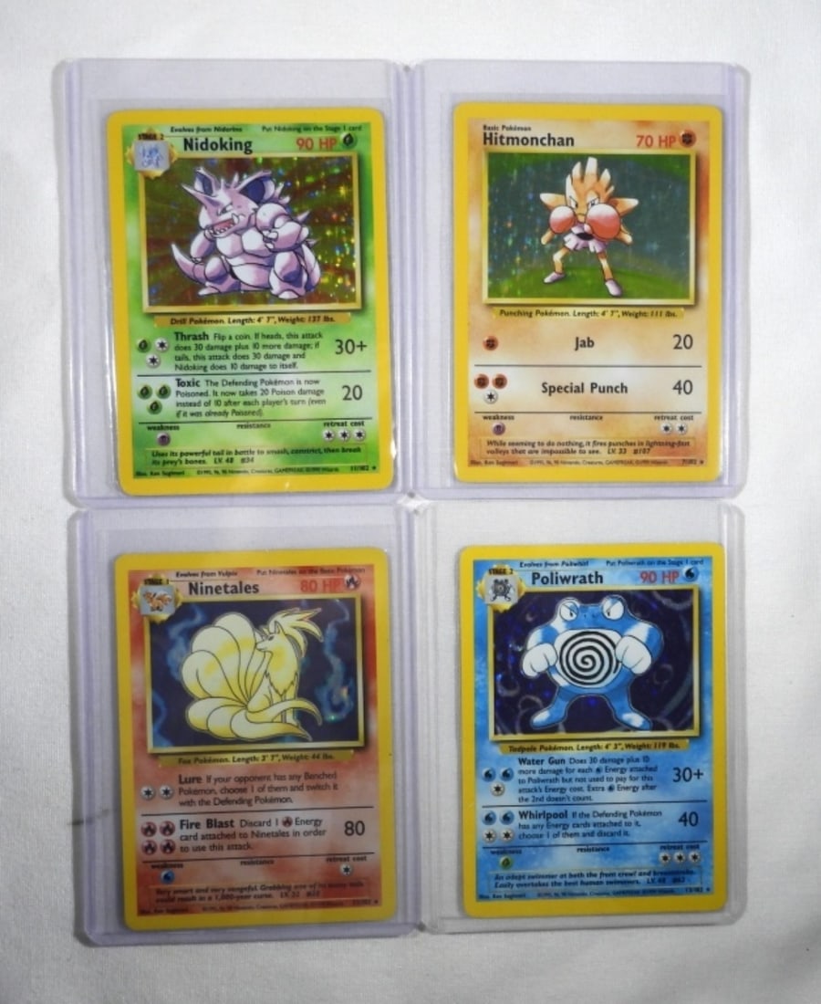 Nidoking, Ninetale, Polwrath: (4) Pokemon cards with reverse holo. Nidoking 11/102. Hitmonchan 7/102. Ninetales 12/102. Poliwrath 13/102 NM/M