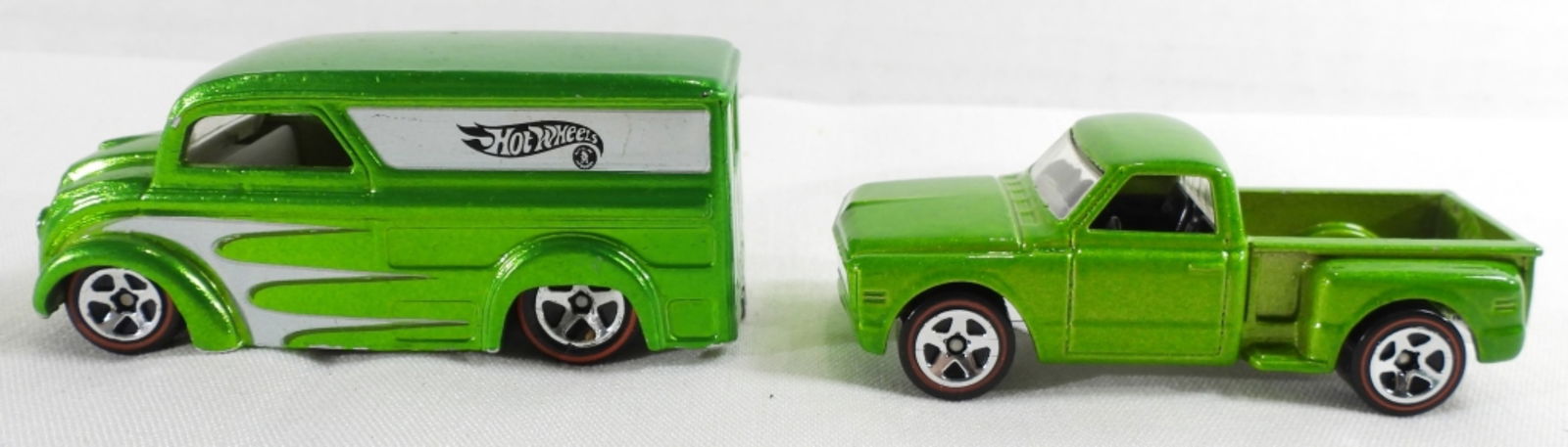 (2) Hot Wheels Red Line Pre-Owned: 1. 1997 Green Dairy Delivery Truck. White inside. 2. 2001 M.I. Customs '69 Green Chevy Truck. Black inside