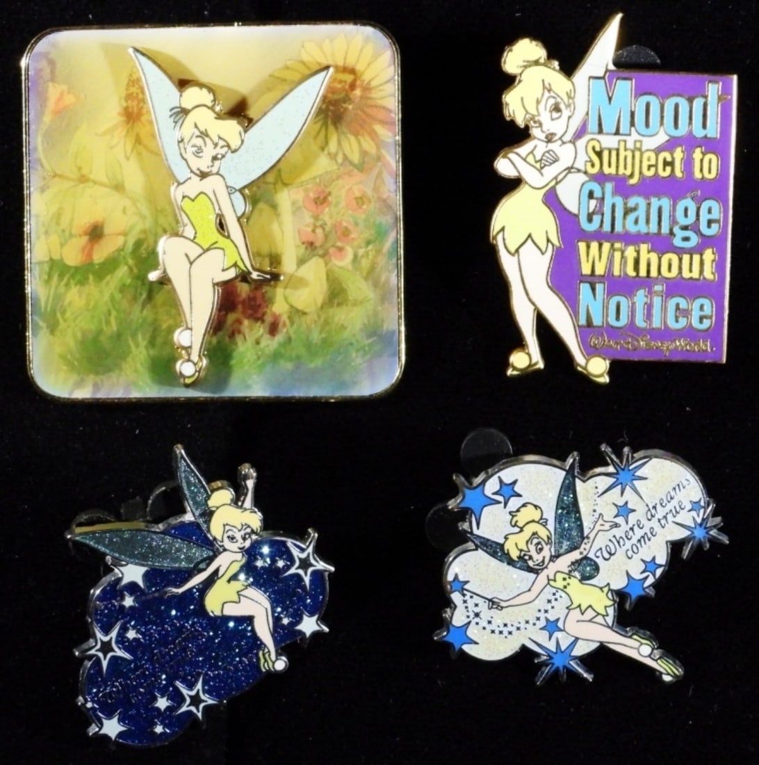(4) Disney Trading Pins Tinker Bell: 2- Where dreams come true from the exclusive Pixie Dust pin. 1-Tinker Bell Mood Subject to change without notice 2006 Official Pin Trading. 1- Tinker Bell watercolor