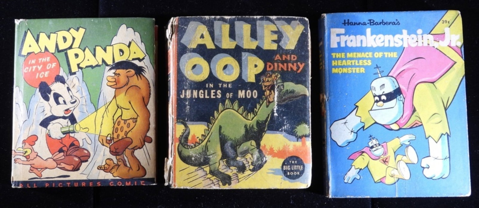 (3) Small Books G-VG: 1) Andy Panda In The City Of Ice. 2) Alley Oop And Dinny In The Jungles Of Moo (the spine has a rip.) 3) Hanna-Barbera's Frankenstein Jr. The Minace Of The Heartless Monster