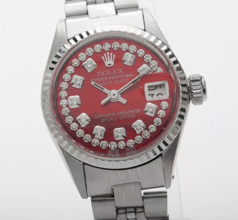 Estate $7000 Red MOP Diamond Rolex DateJust: Estate $7000 Red MOP Diamond Rolex DateJust SS 18kt White gold . diamonds all around 100% genuine Rolex. Original dial has been custom refinished into this master piece. RARE find Just Service Comes w