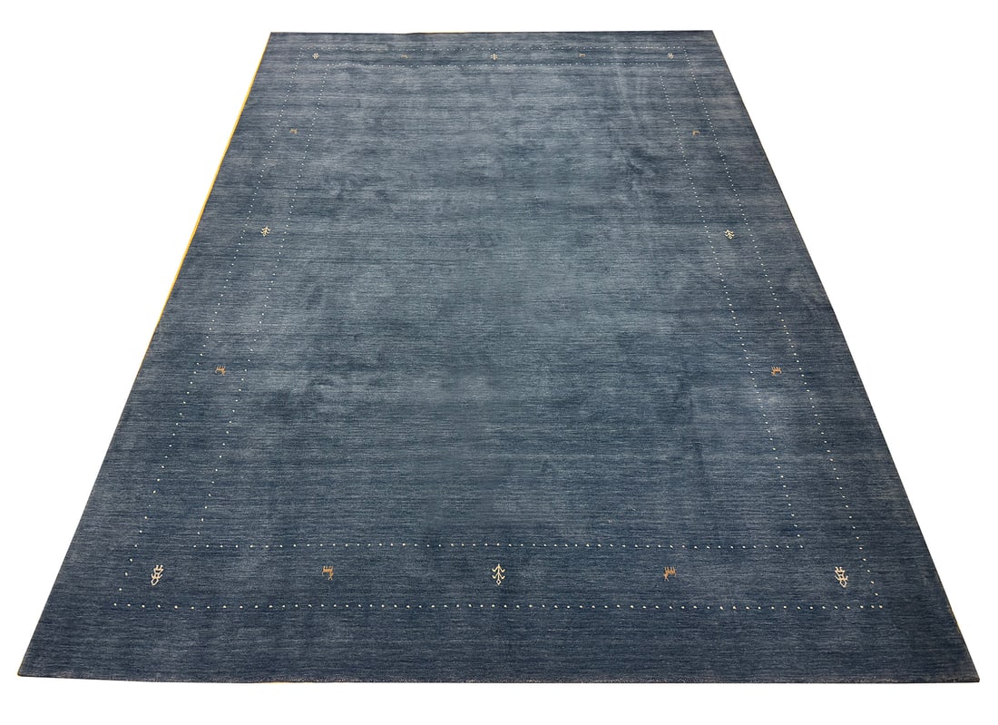 Persian Gabbeh S757 Size 10' x 14' hand knotted: No Reserve Gabbeh S757 Size 10'x 14' This rug showcases the understated elegance of a traditional Gabbeh design, renowned for its simplicity, rich texture, and artisanal authenticity. The deep denim b