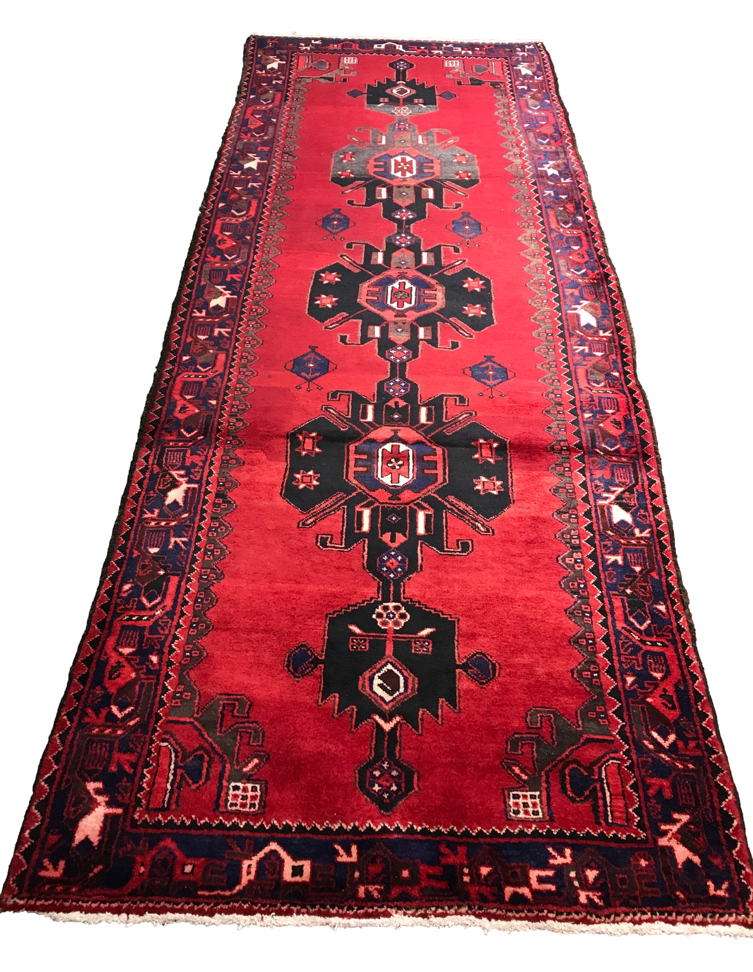 Persian Serapi 1521 Vintage Wool Runner 3'2" x 9'6" hand knotted in Iran: No Reserve Serapi 1521 Vintage Wool Runner, 3'2"x9'6" hand-knotted in Iran in the 1960s and in very good condition (see photos).This bold and captivating Serapi runner showcases the timeless artistry