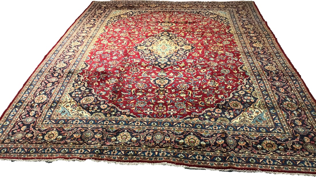 Persian Mashad 1303 Vintage Wool Rug 9'10" x 1210" hand knotted in Iran: No Reserve Persian Mashhad 1303, 9'10" x 12'10", hand-knotted in Iran in the 1960s and in very good condition (see photos).This magnificent Mashad rug exemplifies the grandeur and artistry of Persian