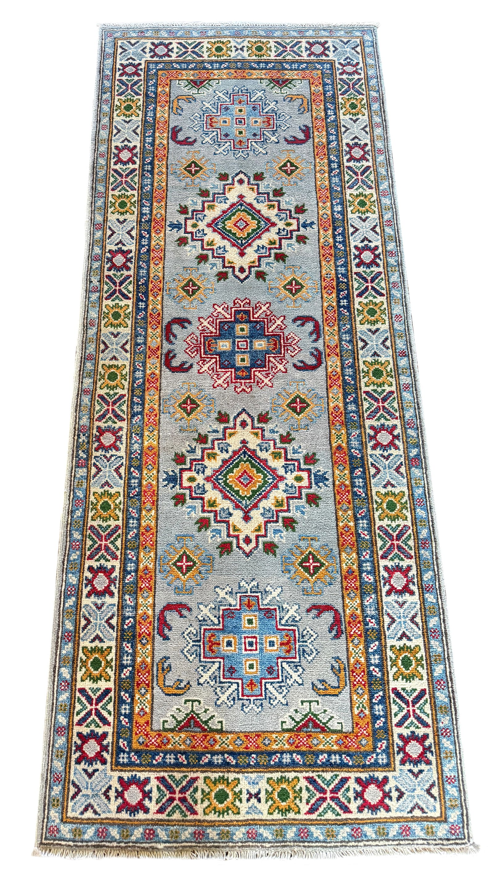 Persian Kazak S747 2'8 x 6'10" hand-knotted: No Reserve Kazak S747, 2'8" x 6'10" in pristine condition, wool with natural dyes retail value $1,500 to $2,000. This runner features a classic Kazak design, admired for its bold geometric motifs, sof
