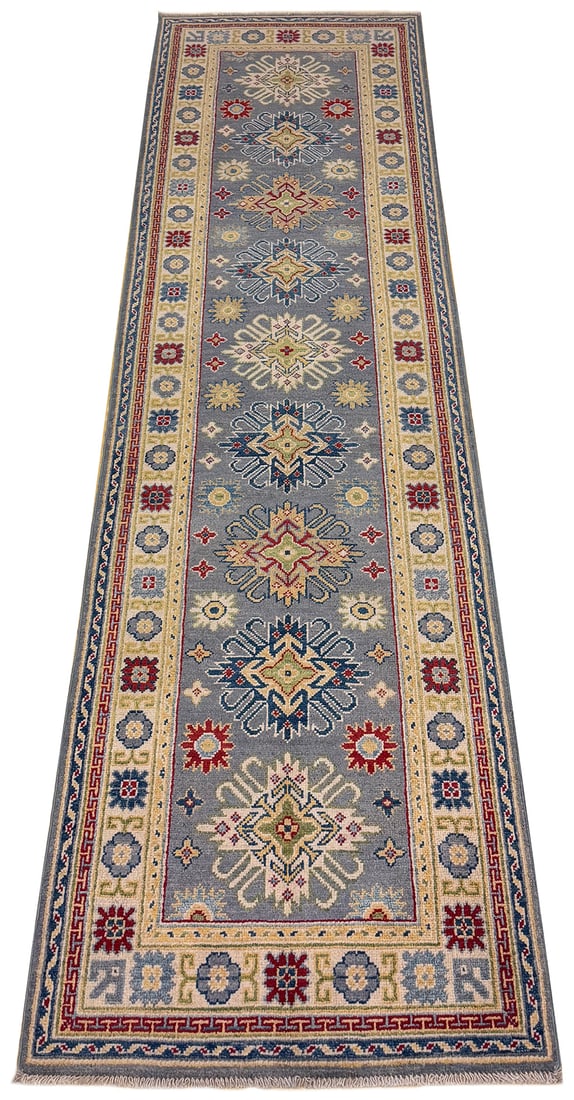 Persian Kazak D874 2'8" x 9'2" hand knotted: No Reserve Kazak D874 2'8"x9'2" This runner displays a traditional Persian-inspired geometric design featuring a series of diamond and medallion motifs arranged symmetrically along its rich red field.